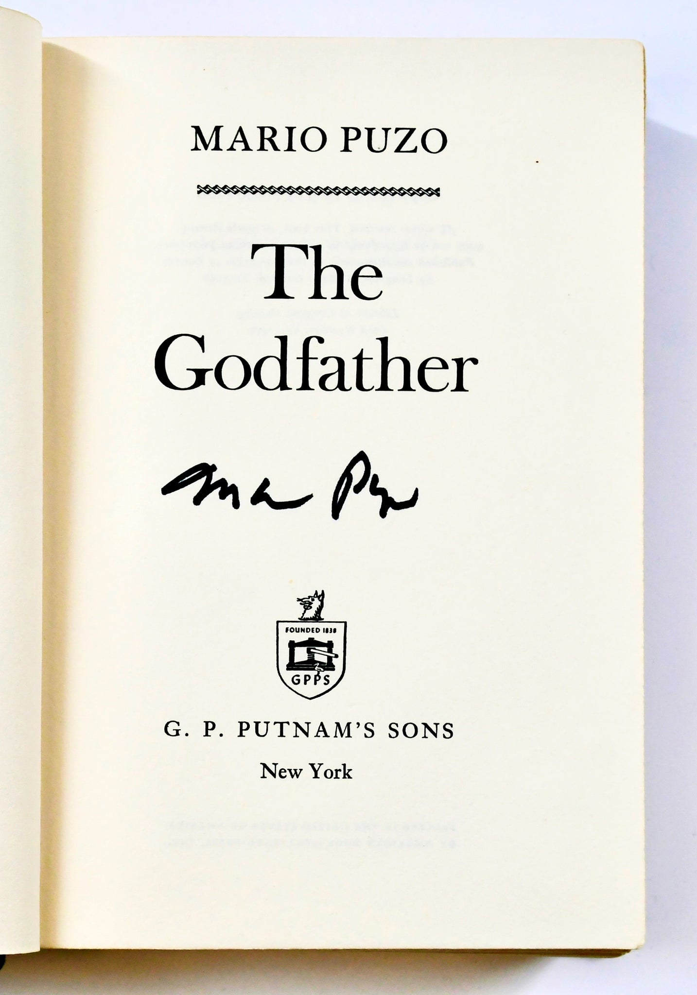 A One-of-a-Kind First Edition of Mario Puzo's The Godfather, signed by him, Francis Ford Coppola, Al Pacino, Diane Keaton, Robert Evans, and Robert Towne